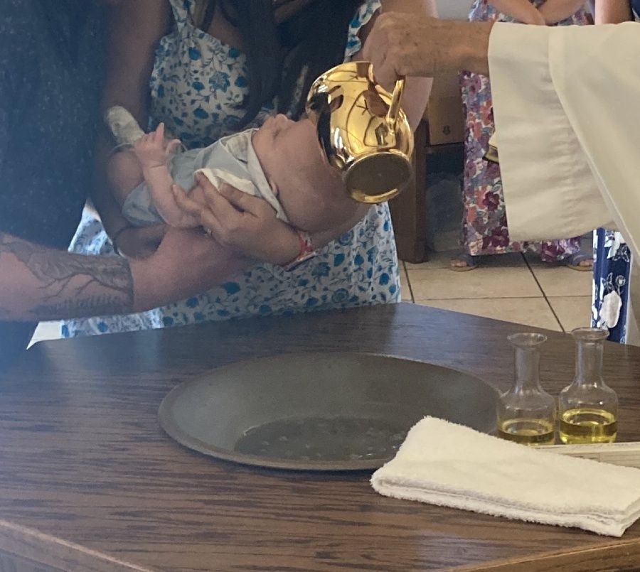 Baby being baptised